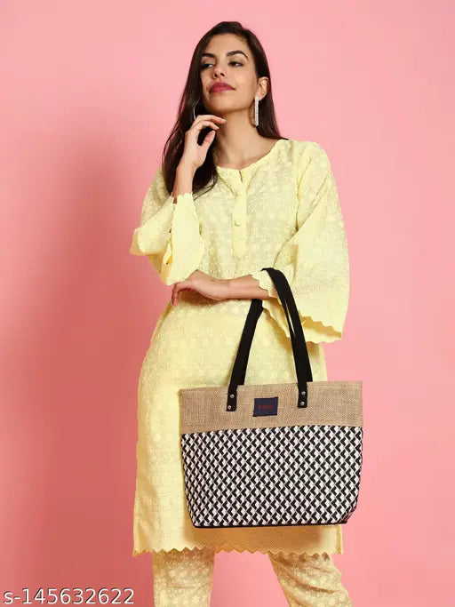 Yellow canvas shoulder bag, hand-embroidered with black and white pattern