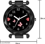 Black analog girls' watch with silver hands, a butterfly motif on the face, and a heart at 6 o'clock. Featuring a steel chain and a silver case. The display shows the time as 3:15 and has a red background with white numbers. The image also indicates dimensions in millimeters, including a height of 9mm