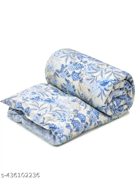 Multicolored, lightweight single bed comforter (60x88 inches), cotton, ideal for mild winter and travel. Made in India