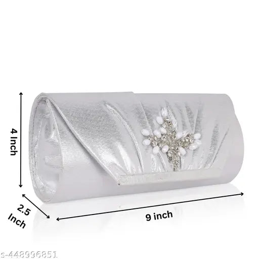 A glamorous silver sparkle evening clutch for women, embellished with a jeweled flower detail, perfect for weddings or parties