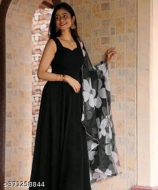 Black Georgette sleeveless blouse with printed floral design, featuring single bloom in black hue