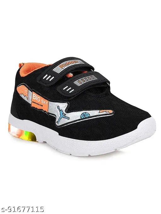 Black sneakers with a light-up feature, neon green accents