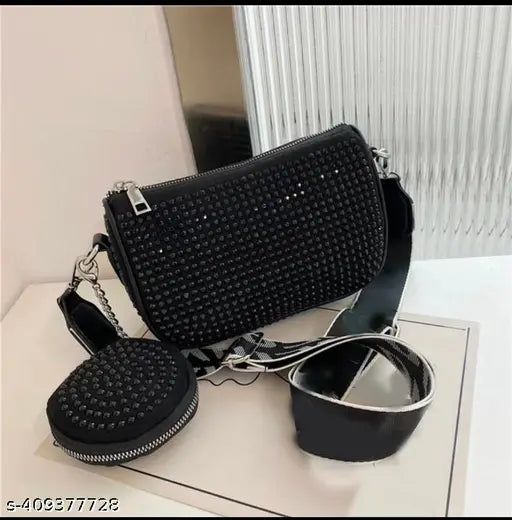 Black embellished fabric sling bag with multiple pockets