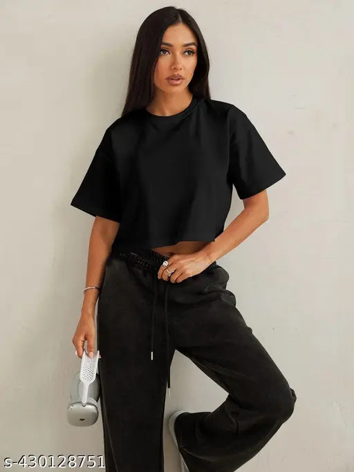 Black cotton casual crop top, loose fit with drop down shoulders and round neck, perfect for women's summer wear