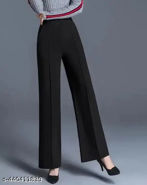 Black high-waisted trousers with red detailing