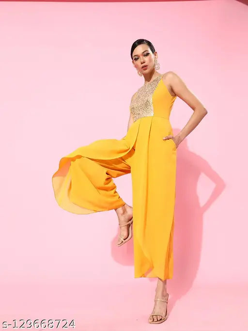 Mustard solid halter neck polyester jumpsuit for women, embellished with pleats on front, India origin