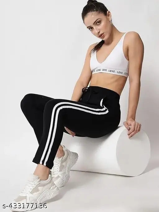 Black adidas striped leggings, white crop top
