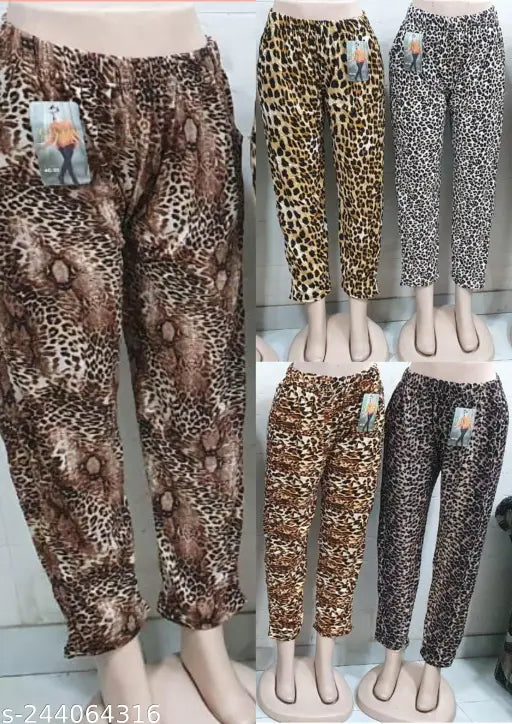 Tall brown and white tiger print leggings with zipper detail