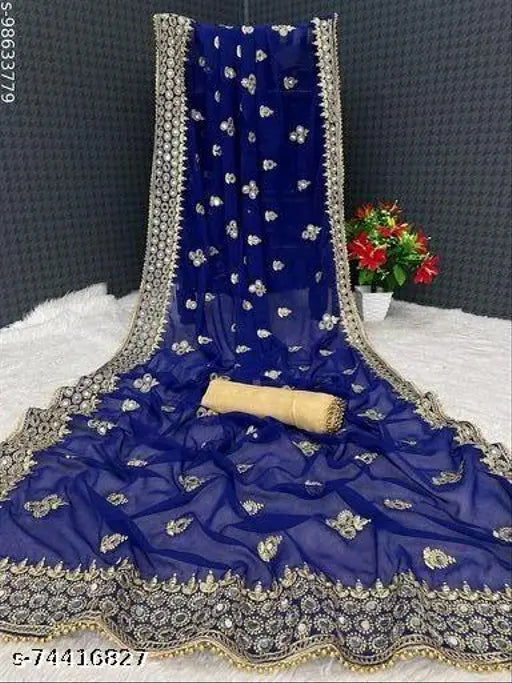 A blue saree with a matching dupatta, intricate designs, and a small tag attached