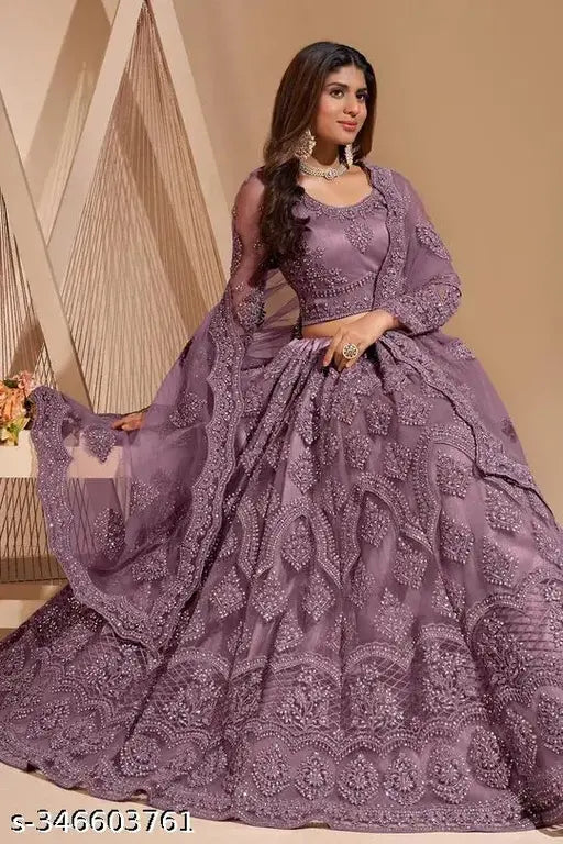 Embroidered semi-stitched net lehenga choli for women and girls, showcasing attractive blouse piece and soft net dupatta on a mannequin