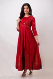 Red rayon Anarkali Kurta with embroidered pattern, three-quarter sleeves - traditional Indian outfit for festive occasions