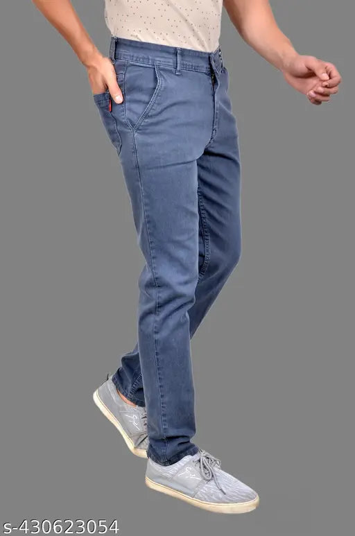 Dark blue stretchy men's jeans with rolled cuffs, zip fly