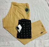 Black trousers set with matching black shirt, long sleeves, pocket detailing