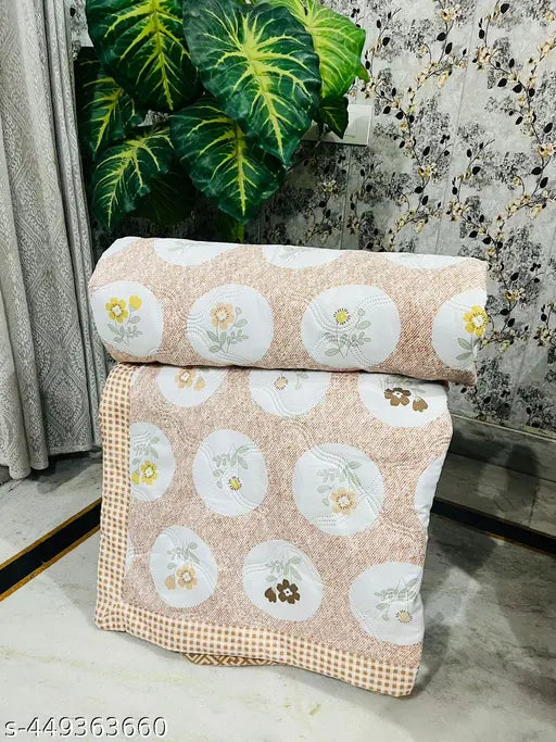 Gold microfiber glace cotton double bed comforter Gsm-145, size 90*100 on display