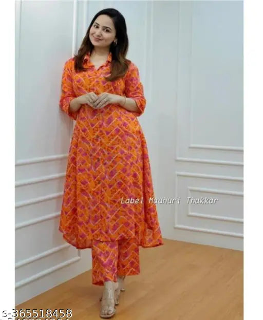 Orange cord Reyon printed kurta with pant sets, cotton and viscose rayon, three-quarter sleeves, printed net, single set, sizes S-XXXL. Dramatic duality Ikat cotton coord set for formal or informal events