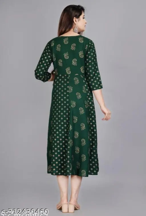 Green rayon Saavi ARJ 2 bottel blouse with three-quarter sleeves, printed combo on a mannequin