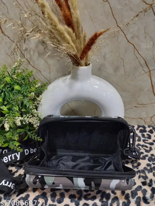 Box crossbody bag, black material with white stitching