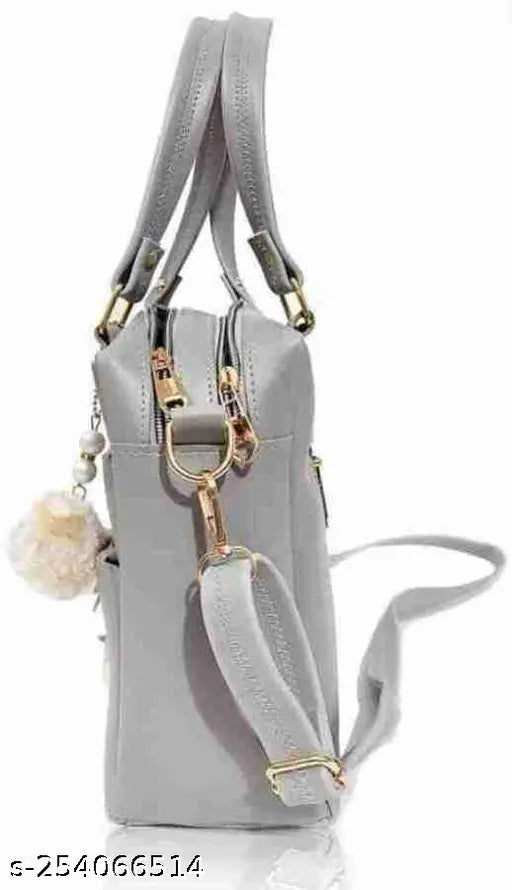 Grey nylon satchel with multiple straps and a flap closure