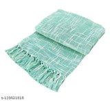 Soft, light blue fringed throw blanket for sofa and couch. Woven with a plush texture, this sofa throw cover measures 140 x 170 cm