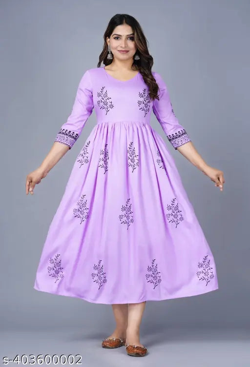 Purple rayon Jaipuri printed women's kurti, vibrant floral design, comfortable three-quarter sleeves