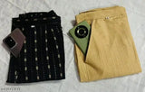 Women's black jacquard trousers with matching shorts and clutch in a satin finish, packaged together in an attractive set