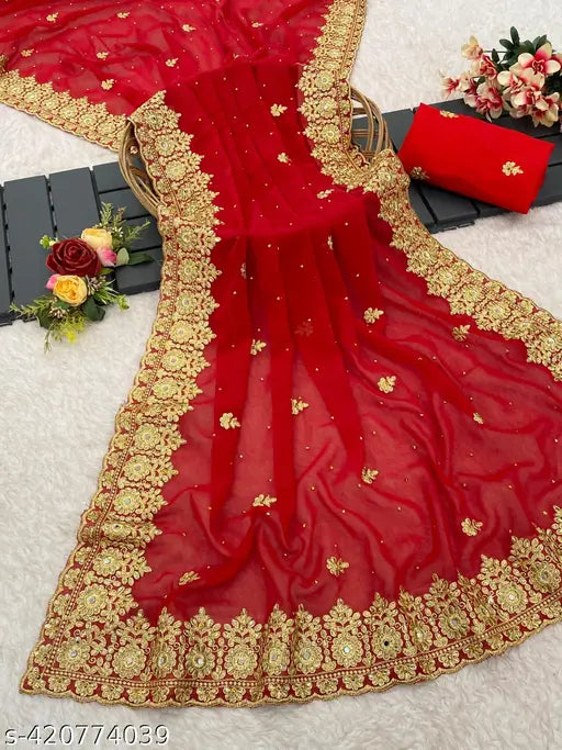 Red saree with intricate gold embroidery, likely silk, showcasing traditional craftsmanship