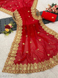 Red saree with intricate gold embroidery, likely silk, showcasing traditional craftsmanship