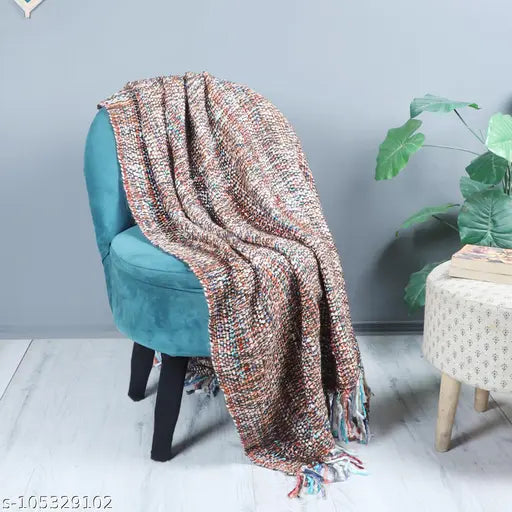 Striped blanket, large size, hanging on back of chair