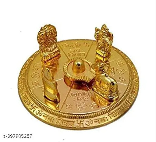 Golden metal sculpture of Hindu deities, including a bull