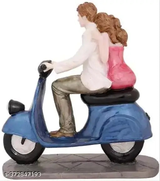 Goldiluxe Resin Scooter Couple Showpiece - Valentine Engagement Statue, ideal for home decor and romantic gift-giving, measuring 8cm x 16cm x 22cm