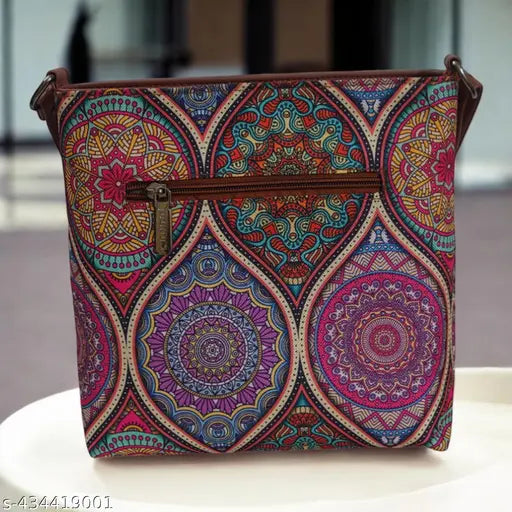 Handcrafted jute sling bag, multicolor print on light brown faux leather, eco-friendly and durable for travel or casual wear. Four compartments for organized storage