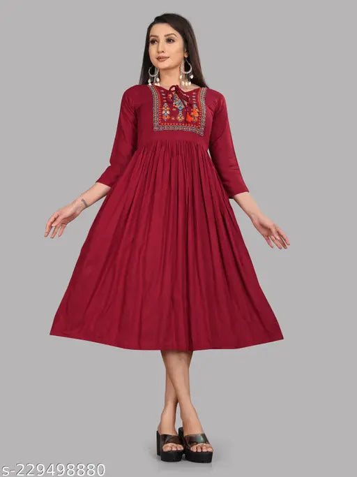 Women's printed maroon kameez with flared skirt