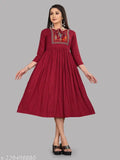 Women's printed maroon kameez with flared skirt