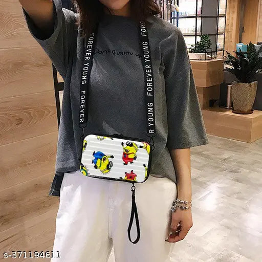 Small, black sling bag with floral print