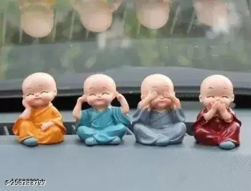 Multi-colored handcrafted baby monk Buddha statues set, 4 decorative showpieces (12cm polyresin)