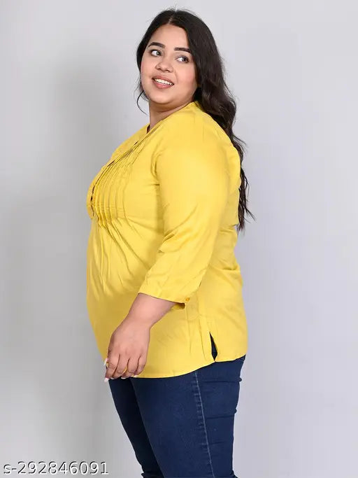 Yellow solid rayon longline top with mandarin collar and pintuck detail, designed for plus size women