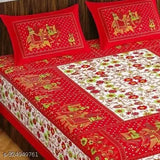 Red floral cotton double bedsheet with 2 pillow covers, featuring elephant design.