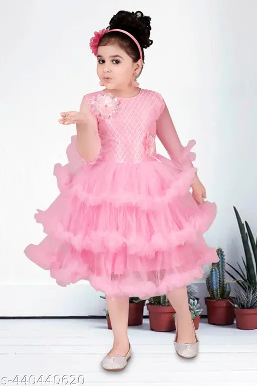 Pink ruffled tulle children's party dress, sash waist design, fastening with buttons