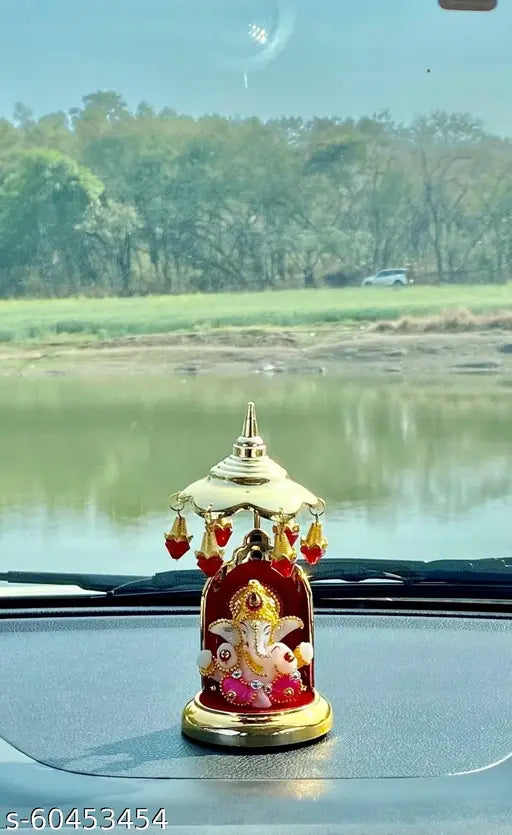 Multicolor polyresin handcrafted Lord Ganesha Idol for home decor, ideal for car dashboard or living room. Perfect gift for Diwali or house warming ceremony