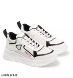 Black & White synthetic leather PU soled casual sneakers with lace-up fastening on a net background, available in various sizes from 3 to 8, made responsibly in India