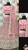 Heavy pink net lehenga choli with embroidery work, semi-stitched blouse, and dupatta. Indian designer ethnic wear for festive occasions and special events