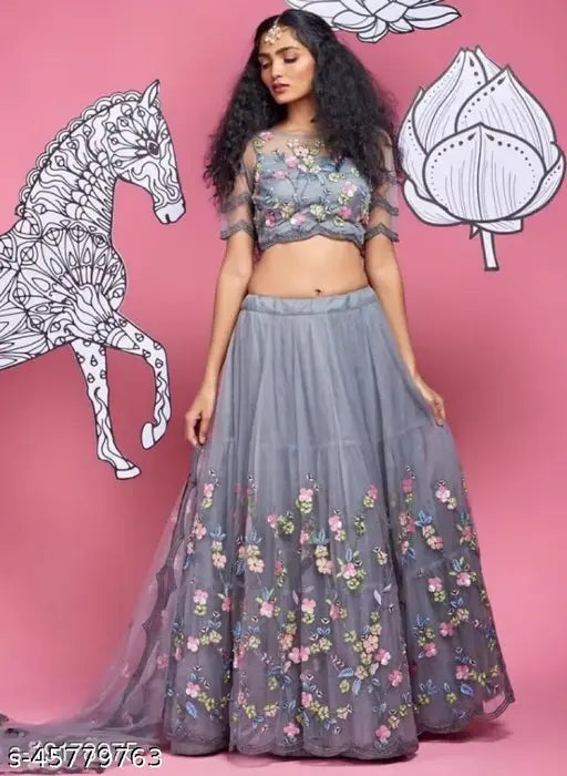 Embroidered net lehenga set for petite women, semi-stitched with 40" waist and 43" length. Handcrafted Indian fashion accessory on display