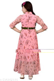 The image displays a long, pink dress with floral print, worn by a person who appears to be posing for the photo