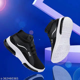 Black and white sports sneakers with velcro closure