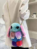 Trendy fuzzy blue, pink, and purple sling bag with a small rabbit on it