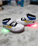 White and blue boys' sneakers with LED light up design