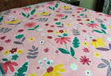 A large quilted dohar featuring a double-sided design, packed with a bag for easy storage