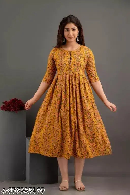 Women's rayon printed Anarkali kurtis, three-quarter sleeve length, vibrant Indian traditional outfit on hanger