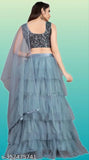 Velvet-sequinned ruffle Satara lehenga choli set on mannequin, semi-stitched net dupatta