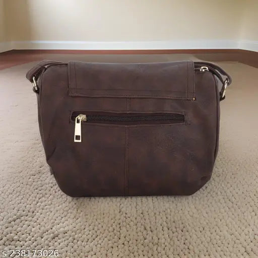 Brown faux leather sling bag, with zip closure